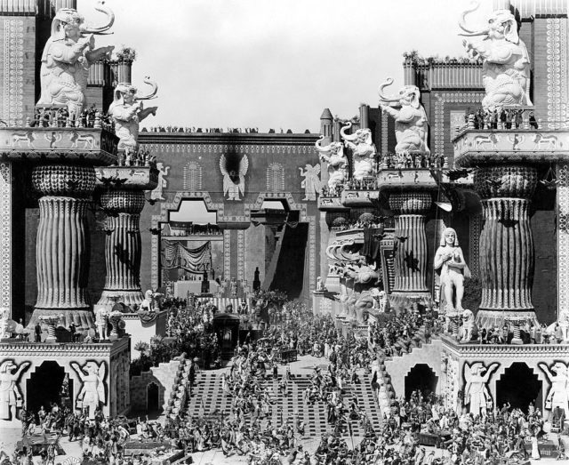 Scene still of Belshazzar’s feast in the central courtyard of Babylon from D. W. Griffith’s 1916 silent film, Intolerance.
