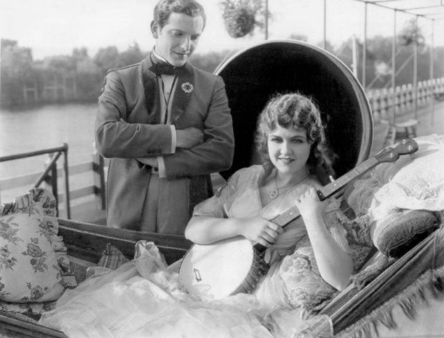 Scene from the 1929 film Show Boat, featuring Laura LaPlante as Magnolia Hawks and Joseph Schildkraut as Gaylord Ravenal.