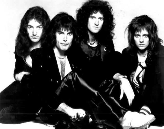 Publicity photo of Queen from 1976. Members from left: John Deacon, Freddie Mercury, Brian May, and Roger Taylor.
