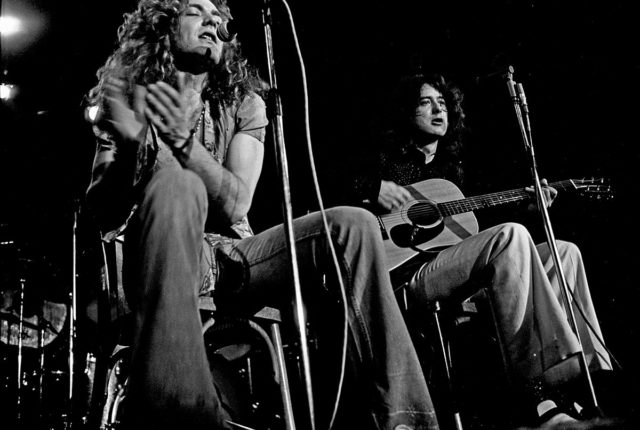 Plant and Page perform acoustically in Hamburg in March 1973. Photo Credit by Heinrich Klaffs CC BY-SA 2.0.