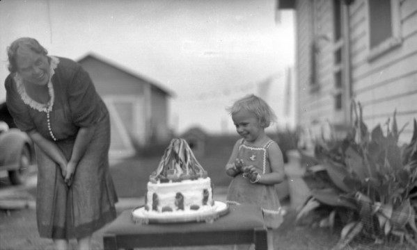 Child with Snow White Cake, circa 1910–1940.