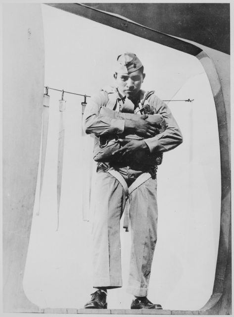 November 10, 1942: Hayes at age 19, in his service uniform appearing ready to jump, at Camp Gillespie, Marine Corps Parachute School