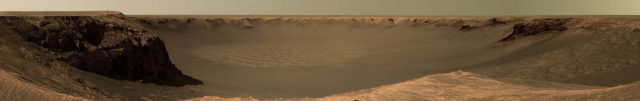 This image taken by the panoramic camera on the Mars Exploration Rover Opportunity shows the view of Victoria Crater from Cape Verde.