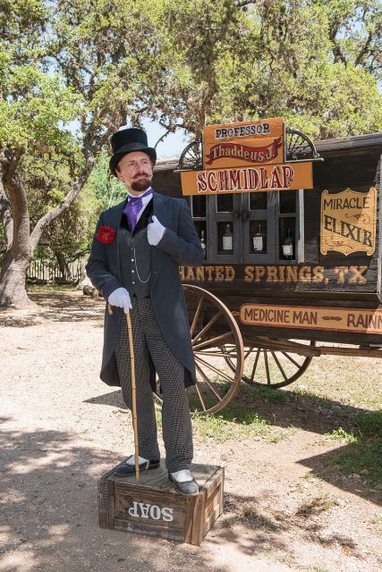 Snake-oil salesman Professor Thaddeus Schmidlap at Enchanted Springs Ranch, Boerne, Texas, USA