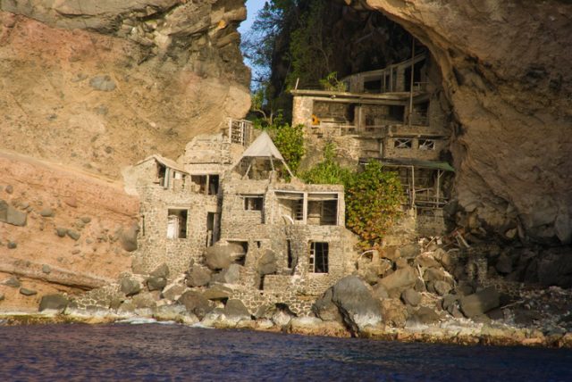 Abandoned Art Colony at Adams Bay on thge island of Bequia, Grenadines.  The arch is also referred to as Moonhole