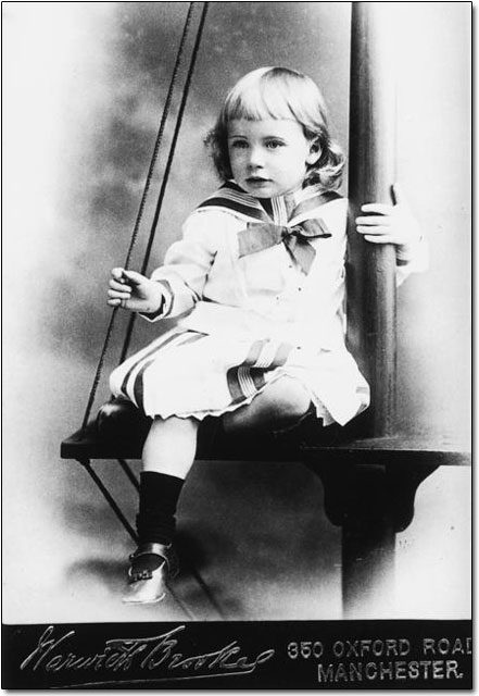 Sailor-style dress on boy, late 19th century. Evidently sufficiently common that the photography studio has a mast prop ready.