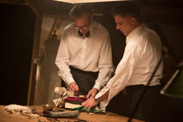 Actor Daniel Day-Lewis (left) and writer/director Paul Thomas Anderson (right) discussa scene on the set of PHANTOM THREAD, a Focus Features release.Photo Credit : Laurie Sparham /Focus Features