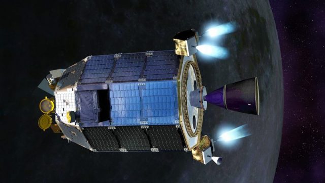 An artist’s concept of NASA’s Lunar Atmosphere and Dust Environment Explorer (LADEE) spacecraft firing its maneuvering thrusters in order to maintain a safe altitude as it orbits the moon.