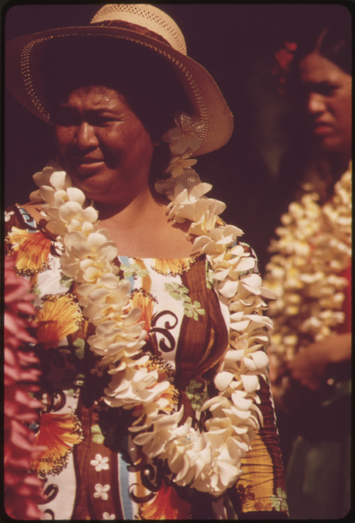 Hawaiians ready to demonstrate hula dance to Waikiki Beach tourists, October 1973