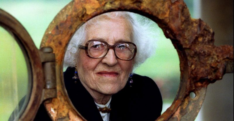 Millvina Dean (1912-2009, staring through an original Titanic porthole) was only a few months old when she boarded the Titanic with her family. She was the youngest survivor of the wreck