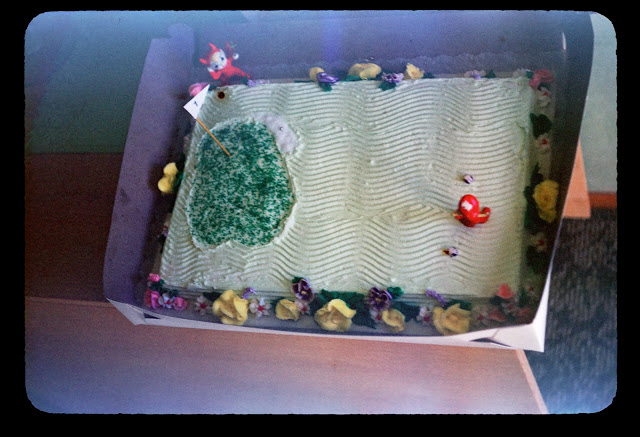 Thats a golfing birthday cake for golfer number one in the house in August 1954.