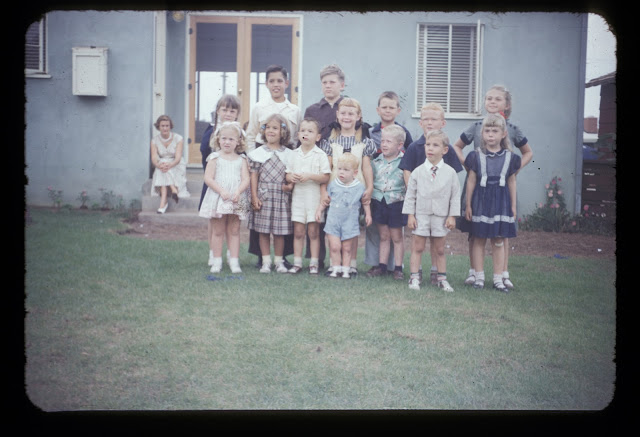 Thats neighborhood kids with no blood relation getting together to take a pic in 1953.