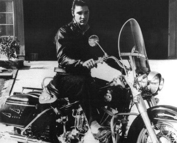 Elvis on his Harley in the back driveway at Audubon Drive, 1956