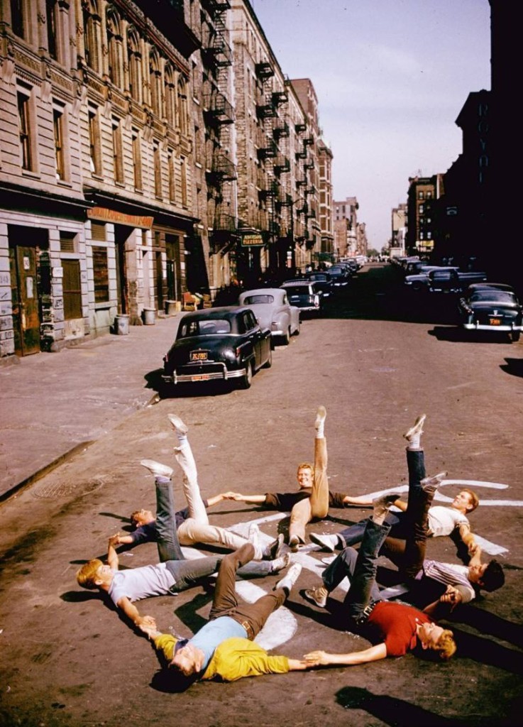 The cast warm up and stretch prior to shooting the Prologue number in West Side Story (1961).
