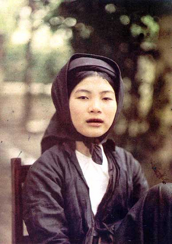 A North Vietnamse girl whose teeth are tinted black, 1915