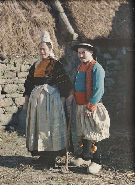 Breton couple in traditional dress, France, photographer George Chevalier, 1920.