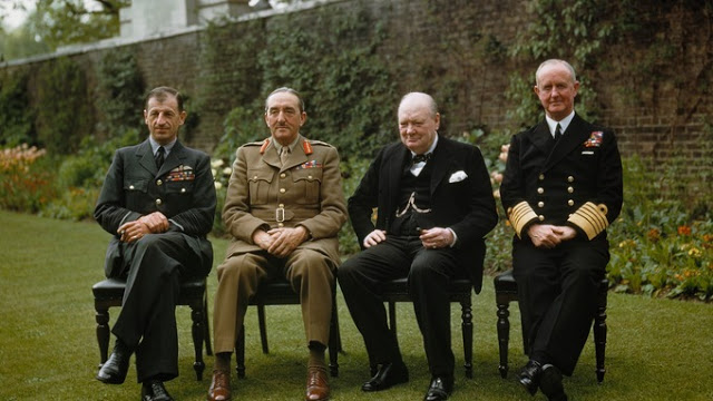 Prime Minister Winston Churchill with his chiefs of staff in the garden of 10 Downing Street in May 7, 1945