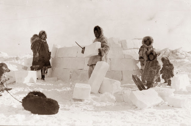 An Eskimo Family building an igloo, 1924. Library of COngres