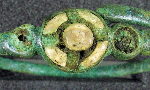 Bronze bracelet with coral decoration discovered at the site in Yorkshire.Source MAP Archeology