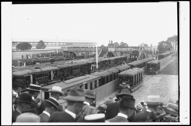 Crossing the overhead bridge to trams at platform below, Randwick, ca. 1914.