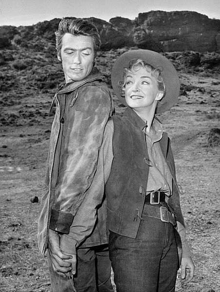Photo of Clint Eastwood ans guest star Nina Foch from an episode of Rawhide. .Source