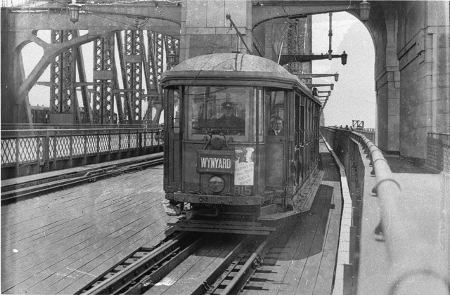 Wynyard-bound tram on Harbour Bridge (now twin roadways to Cahill Expressway), 1930-1939 by Ted Hood.