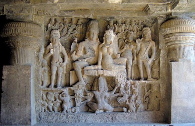 Shiva-Parvati seated on mount Kailash, while Ravana tries to lift it. .source