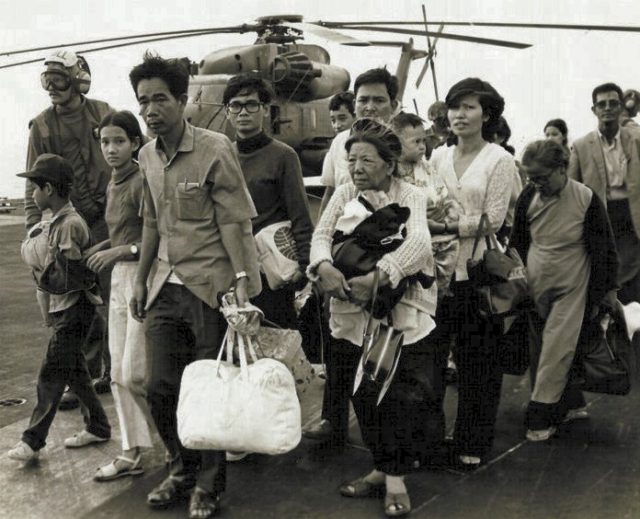 South Vietnamese refugees arrive on a U.S. Navy vessel during Operation Frequent Wind.source