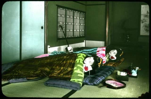 photographic glass-plate transparency; part of a set of colour-tinted transparencies depicting life in Japan ca. 1910