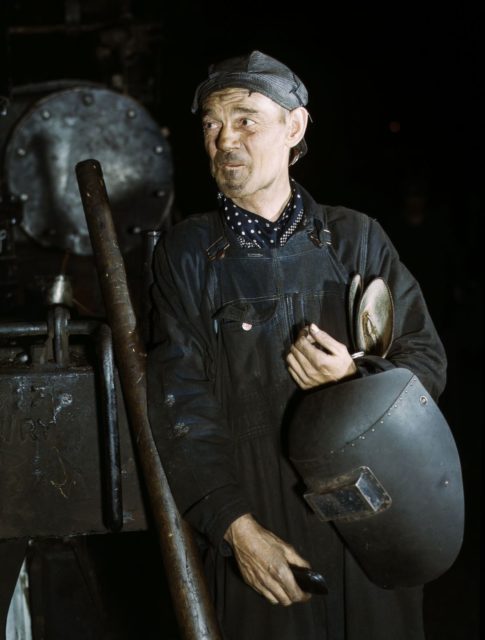 A welder at the Chicago & North Western Railroad locomotive shops, Chicago, Illinois.
