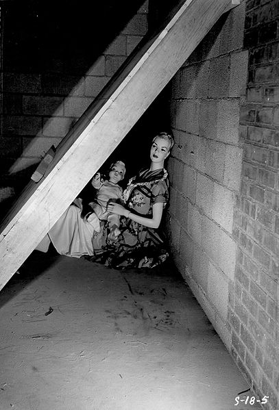 Operation Doorstep Mother and child in a basement - Before the Blast