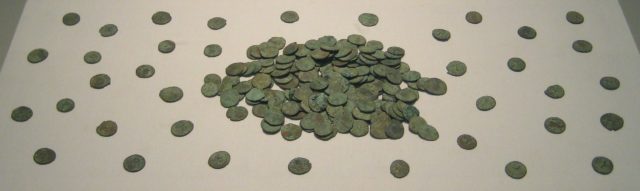 Pile of coins from the Frome Hoard on display at the British Museum.Source