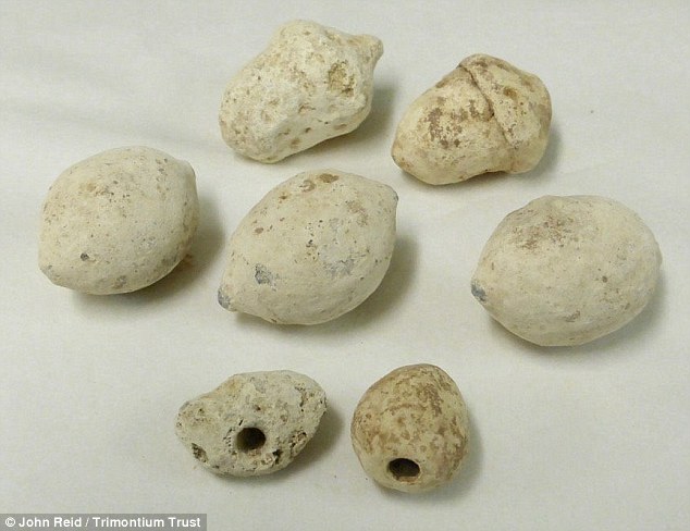 A collection of bullets used 1,800 years ago by the Romans to incite fear into their enemies has been found on a hill in Scotland.Source: John Reid/ The Trimotium Trust