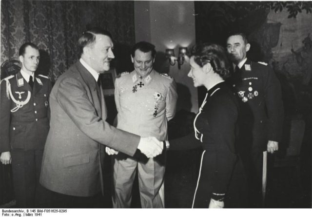 March 1941: Adolf Hitler presenting Hanna Reitsch with the Iron Cross, Second Class. Source