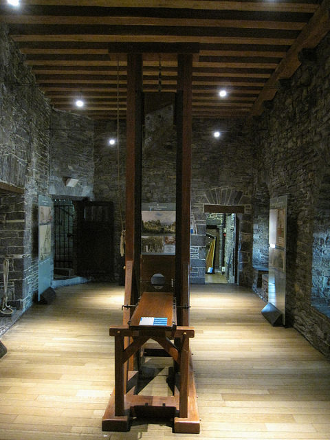 Copy of a guillotine with an original blade on display in the Museum of Torture Instruments in the Gravensteen castle. Source