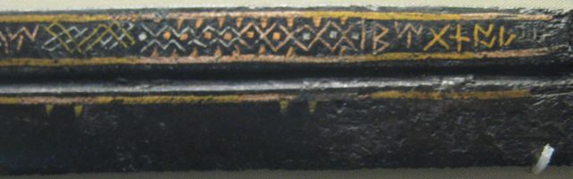 Detail of the Seax of Beagnoth, showing the inlaid wire decoration between the two inscriptions Source