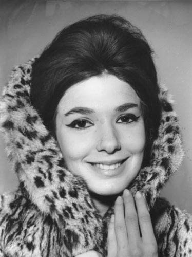 Graciela Borges, Argentine fashion icon of the 1960s, wearing a fur coat, bouffant hair and winged eye liner. Source