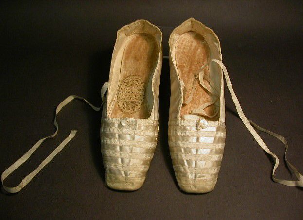 Pair of white satin shoes worn by Queen Victoria on her wedding day, 10 February 1840.Source