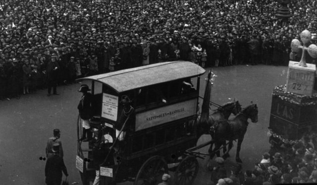 The horse-drawn omnibus Saint- Ouen - Bastille Opera Square parade in the procession of the Mi-Carême in Paris in 1928 Source.