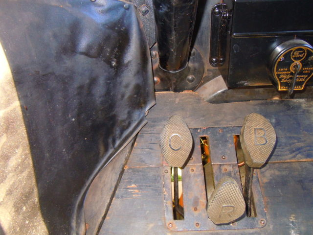 The three pedal controls of the Model T.Source