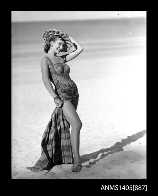 Woman_modelling_swimwear,_28_March_1947Source