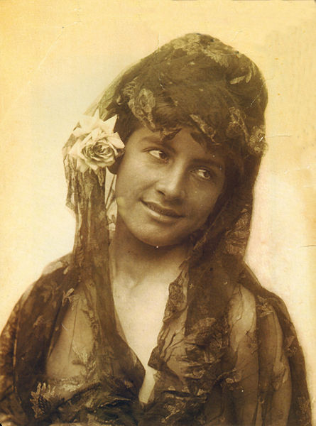 A Sicilian boy cross-dressing as a Spanish woman, photographed by Wilhelm von Gloeden in the late 19th century.