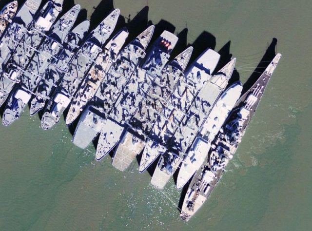 Closeup of ships of the US National Defense Reserve Fleet laid-up in Suisun Bay, By USGS/Wikipedia/Public Domain