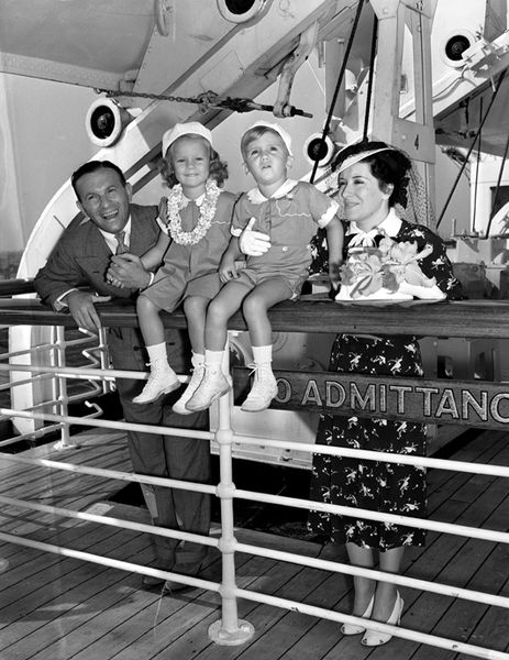 Gracie Allen, George Burns and children aboard Matson flagship Lurline just before they sailed for Hawaii, 1938