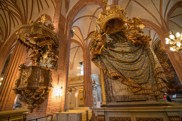 One of the Royal Pews, their crowns and the pulpit. Source
