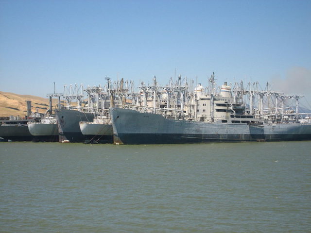 Image of part of the Suisun Bay Reserve Fleet, SS Cape Aide markings visible. By Earthpig/CC BY-SA 3.0