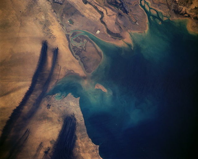 Smoke plumes from a few of the Kuwaiti Oil Fires on April 7, 1991.