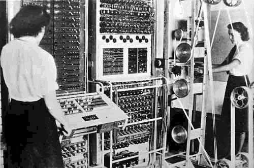 A Colossus Mark 2 computer being operated by Dorothy Du Boisson (left) and Elsie Booker in 1943. Source