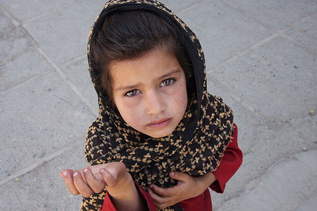 Afghan girl begging in Kabul Source:By Evstafiev - Own work, CC BY 3.0, 
