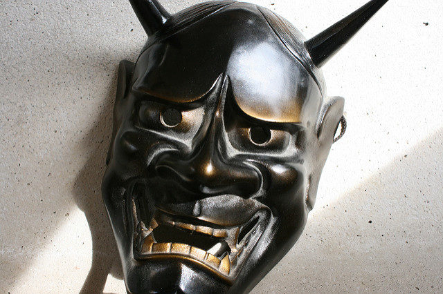 A No (traditional abstract japanese theatre) mask portraying a hannya (female demon). Image by- Tommaso Meli.Flickr. CC BY 2.0